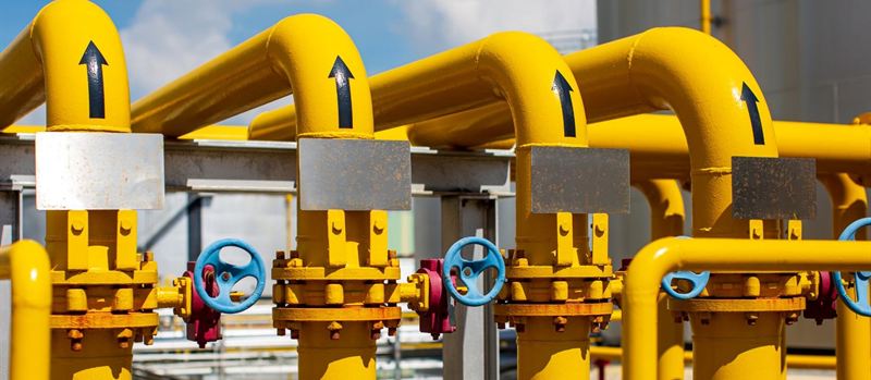 Yellow gas pipework risers with isolation valves at a site in Spalding | Gas Main Installation Yellow gas pipework risers with isolation valves at a site in Spalding