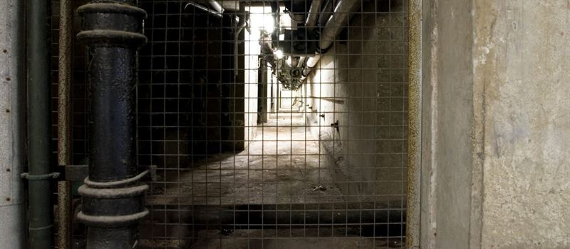 Old gas pipework in a basement service corridor in Liverpool | Gas Main Installation Old gas pipework in a basement service corridor in Liverpool